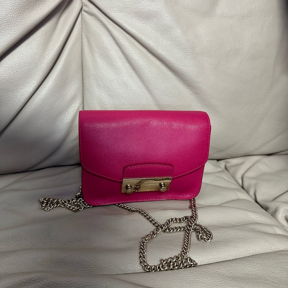 Furla crossbody will definitely bring attention to your wardrobe